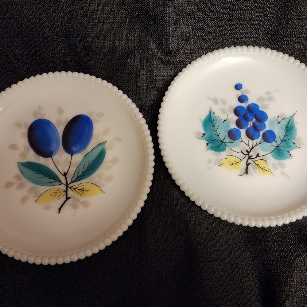 Elegant White Plates with Blue and Yellow Fruit Design
